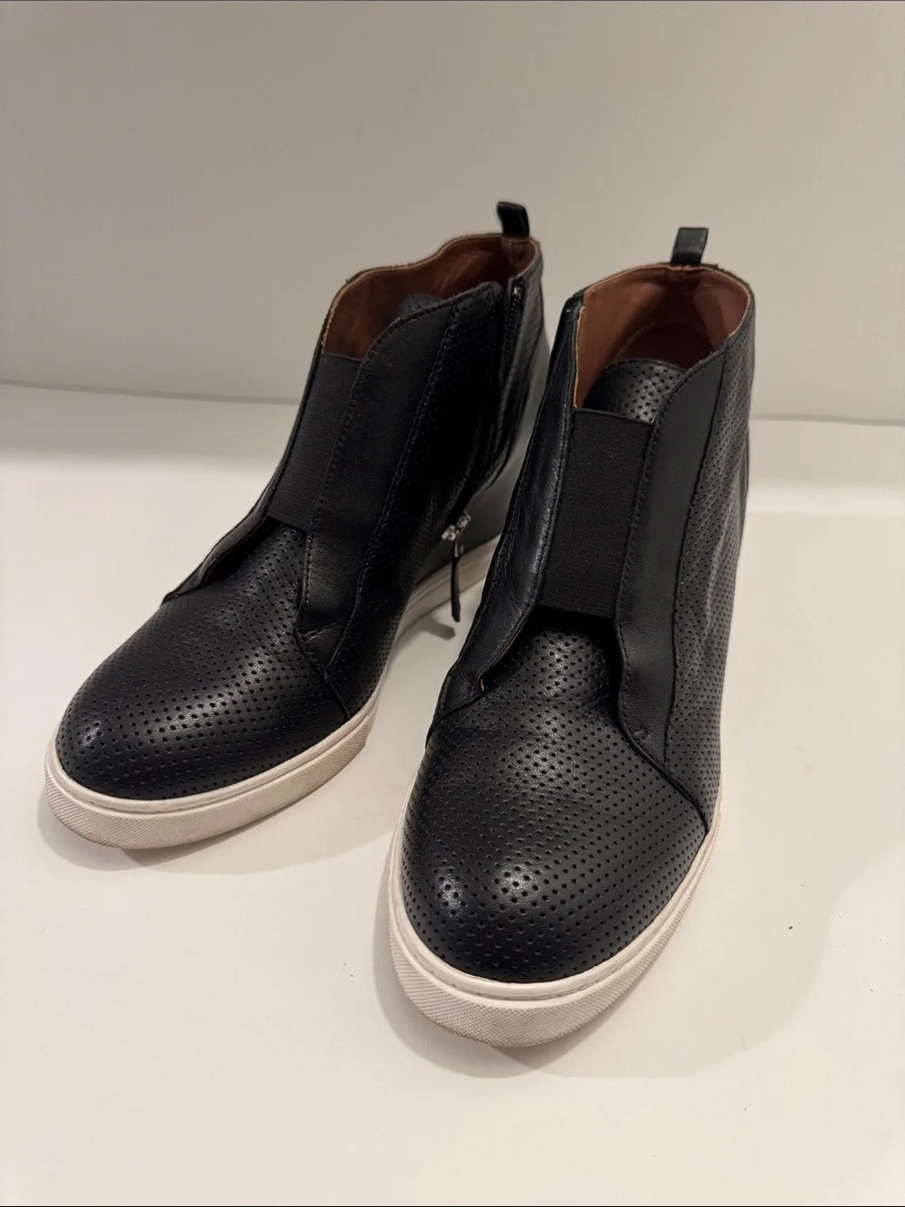 L.Paolo Women’s Black Leather Perforated Wedge Sneakers